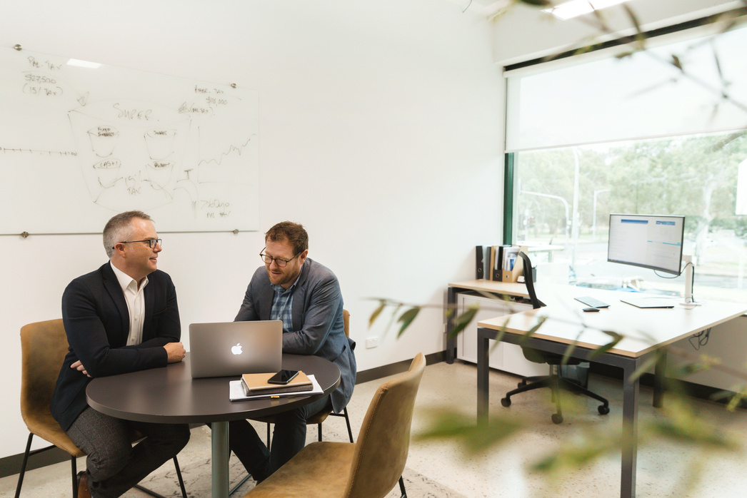 Financial advisors working with a client