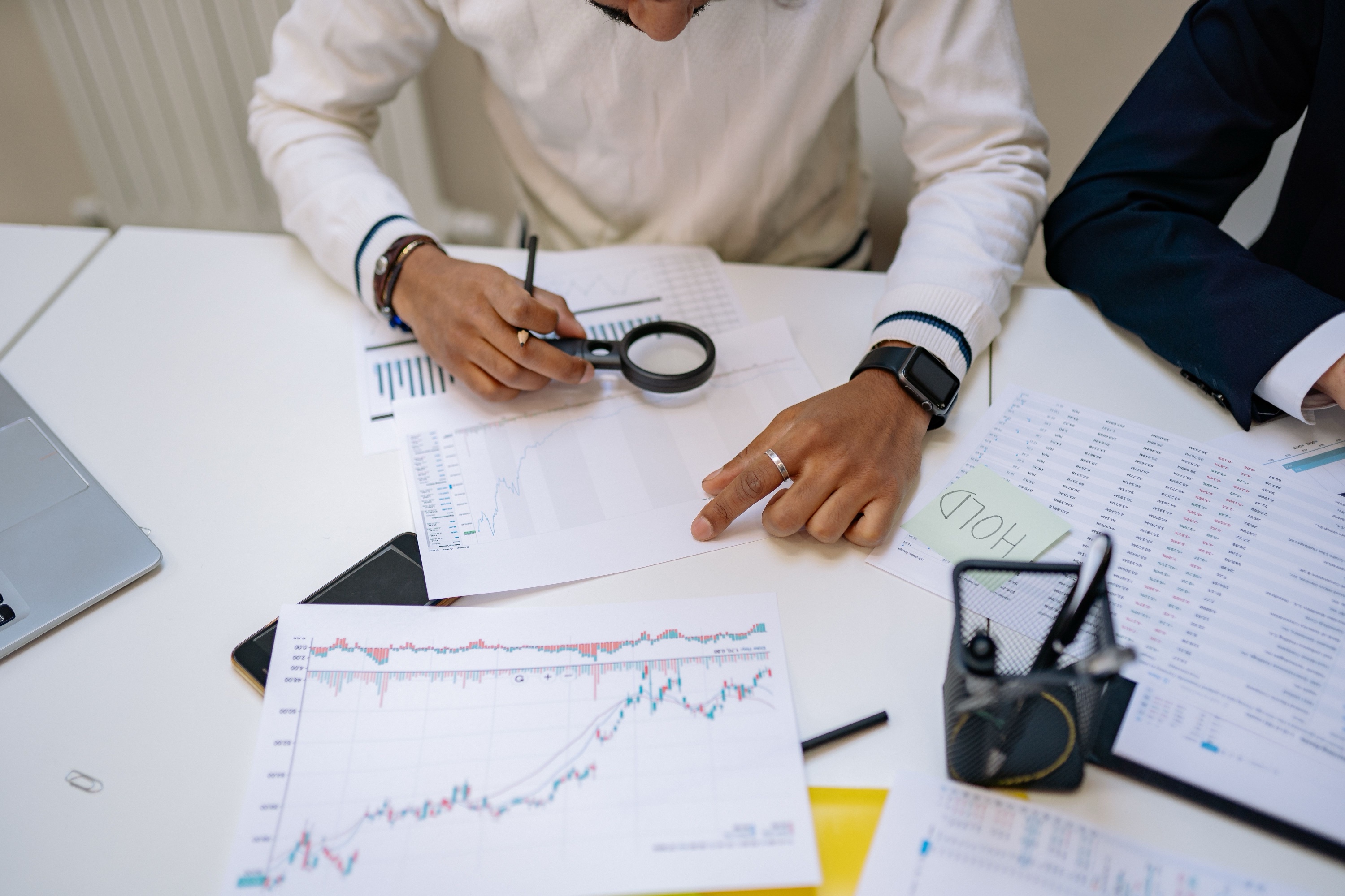 Financial professionals reviewing business performance